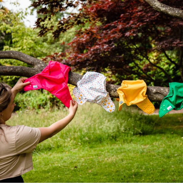 Cloth nappies drying on washing line